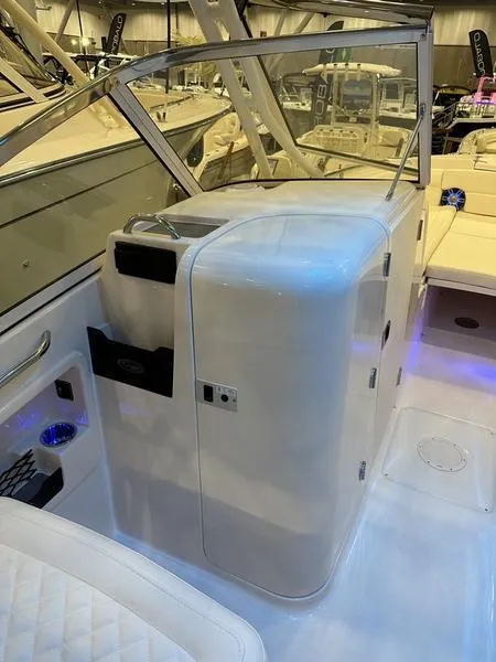 Slide: The Image of 2025 Grady-White Freedom 275 boat interior with sleek design and modern amenities. - 12