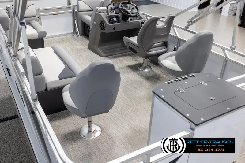 Slide: The Image of 2025 Avalon VEN RF boat interior with gray seating and modern helm. - 11