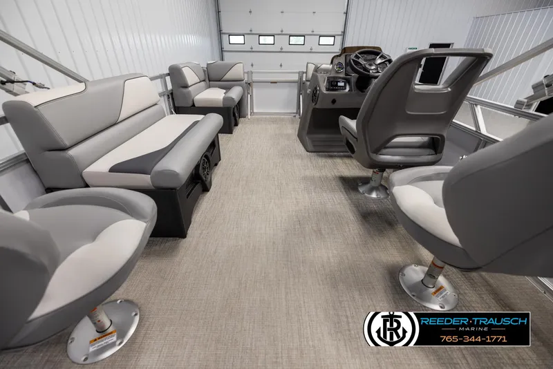 Slide: The Image of Interior of 2025 Avalon VEN RF boat with modern seating and steering console. - 16