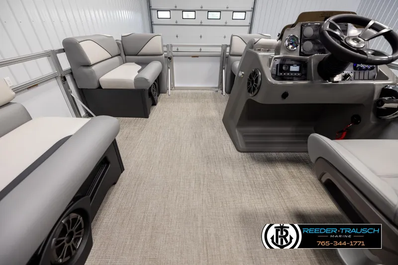 Slide: The Image of Interior of 2025 Avalon VEN RF boat with modern seating and control panel. - 17
