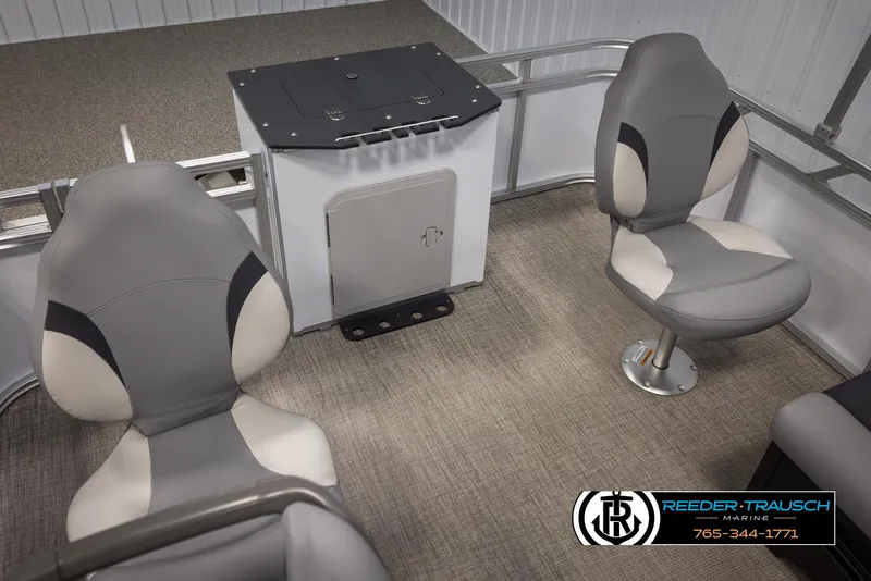 Slide: The Image of Interior of 2025 Avalon VEN RF boat with gray seating and carpeted flooring. - 20