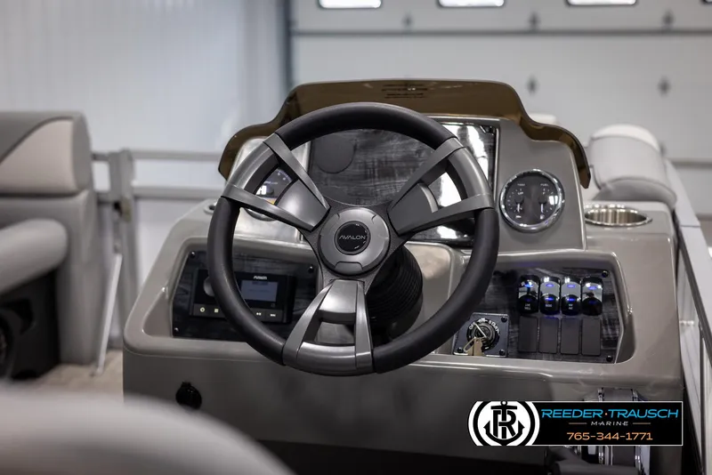 Slide: The Image of Steering console of 2025 Avalon VEN RF boat with modern controls and dashboard. - 25