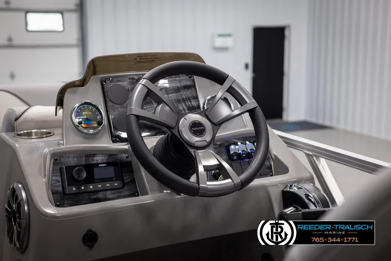 Slide: The Image of Steering console of 2025 Avalon VEN RF boat with modern controls and dashboard. - 26