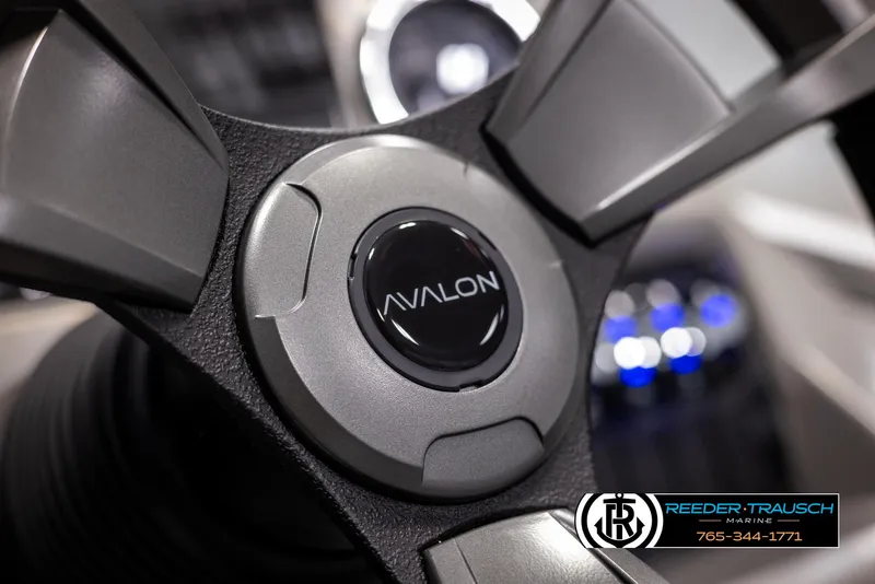 Slide: The Image of Close-up of 2025 Avalon VEN RF steering wheel with logo. - 27