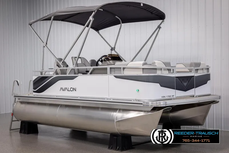 Slide: The Image of 2025 Avalon VEN RF pontoon boat with canopy in showroom. - 3