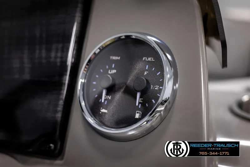 Slide: The Image of Close-up of Avalon VEN RF 2025 dashboard gauge, showing trim and fuel levels. - 30