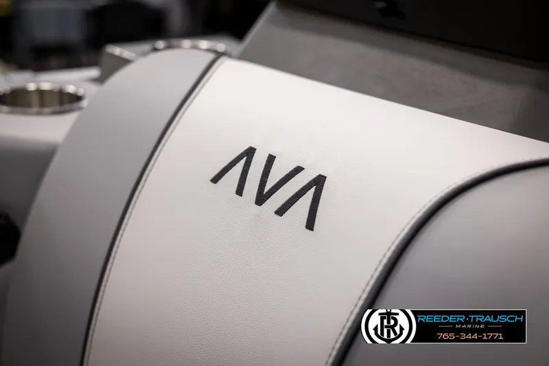 Slide: The Image of Avalon VEN RF 2025 boat seat with logo, Reeder-Trausch Marine branding. - 34