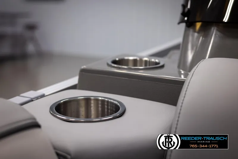 Slide: The Image of Cup holders in a 2025 Avalon VEN RF boat interior, featuring sleek design and comfort. - 36