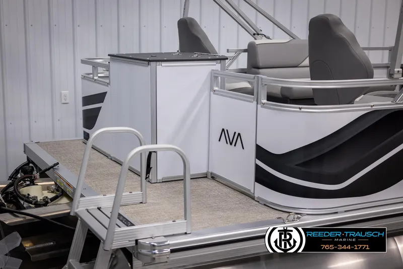 Slide: The Image of 2025 Avalon VEN RF pontoon boat interior with sleek design and comfortable seating. - 39