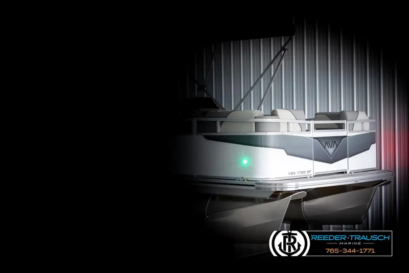 Slide: The Image of 2025 Avalon VEN RF boat in a dimly lit showroom, Reeder-Trausch Marine logo visible. - 4