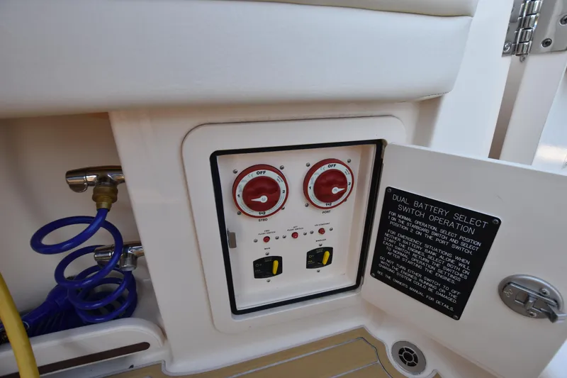 Slide: The Image of 2019 Grady-White Freedom 325 boat battery control panel with dual switches. - 45