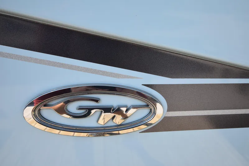Slide: The Image of Grady-White Freedom 325 boat logo, 2019 model, with sleek design accents. - 48