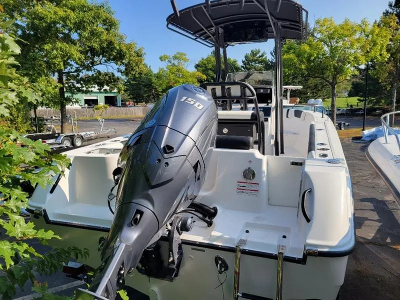 Slide: The Image of 2025 Edgewater 208 WATCHMAN boat with powerful 150 HP outboard motor. - 11