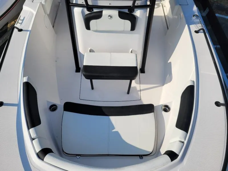 Slide: The Image of 2025 Edgewater 208 WATCHMAN boat interior with white and black seating. - 2