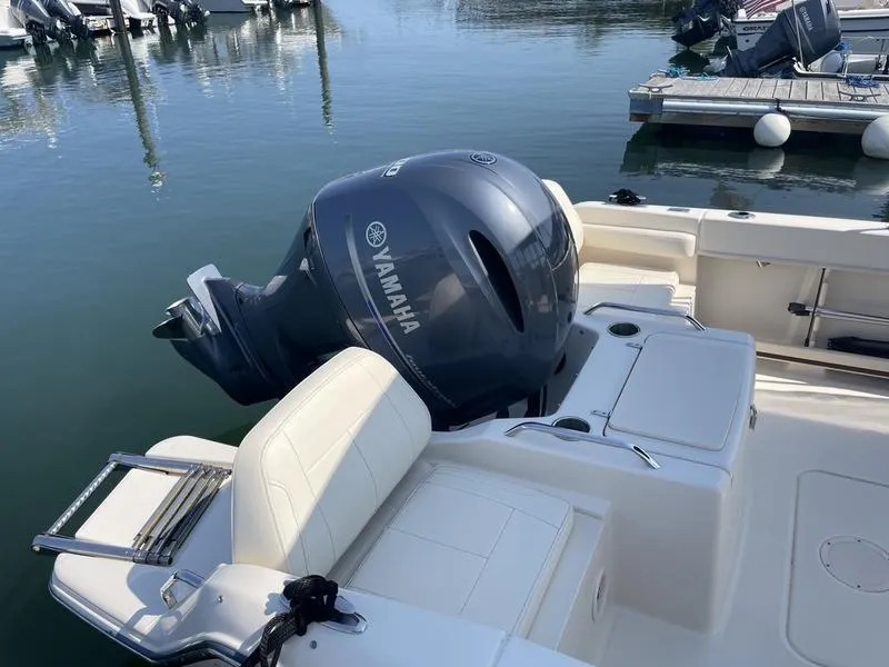 Slide: The Image of 2020 Grady-White 215 Freedom boat with Yamaha outboard motor at marina. - 10
