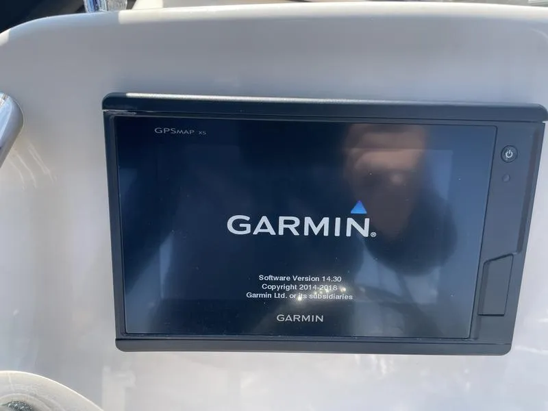 Slide: The Image of Garmin GPS display on 2020 Grady-White 215 Freedom boat dashboard. - 11