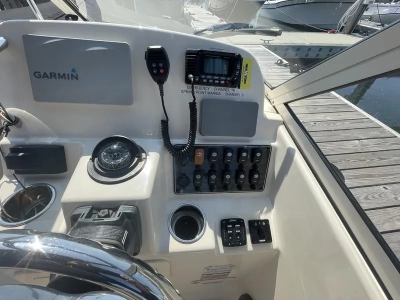 Slide: The Image of Grady-White 215 Freedom 2020 boat dashboard with Garmin navigation system. - 3