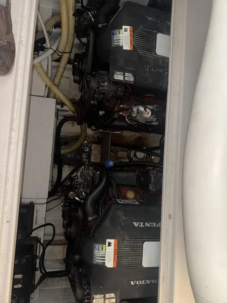 Slide: The Image of 2005 Four Winns 298 Vista engine compartment with Volvo Penta engines. - 1