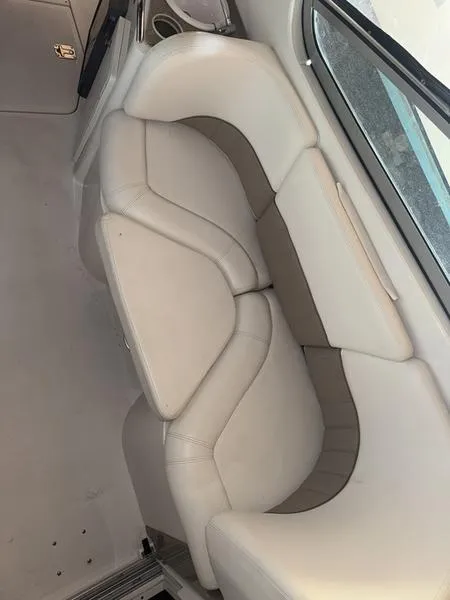 Slide: The Image of 2005 Four Winns 298 Vista boat interior with white leather seating. - 21