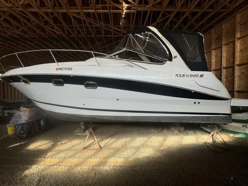 Slide: The Image of 2005 Four Winns 298 Vista boat in storage, side view. - 27