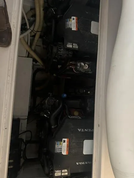 Slide: The Image of 2005 Four Winns 298 Vista engine compartment with Volvo Penta engines. - 5