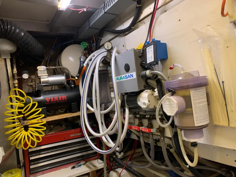 Slide: The Image of Engine room of 1989 Carver Californian 48 with Purasan system and Viair compressor. - 33