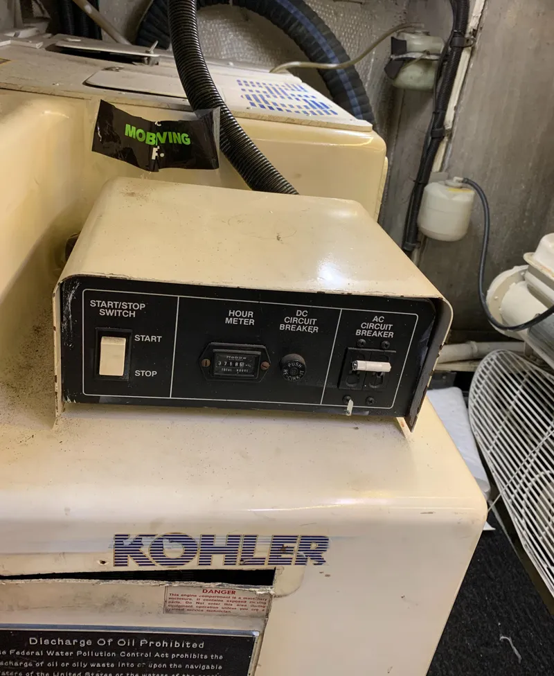 Slide: The Image of Control panel of a Kohler generator on a 1989 Carver Californian 48 yacht. - 26