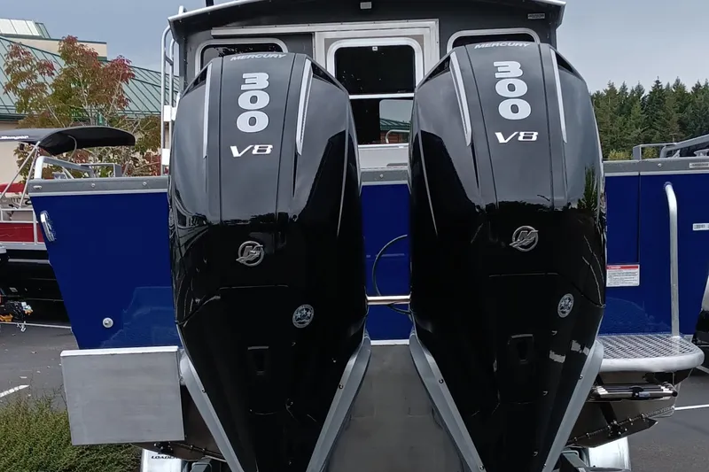 Slide: The Image of 2025 Spartan 2800 Olympia with dual 300 V8 outboard engines. - 2