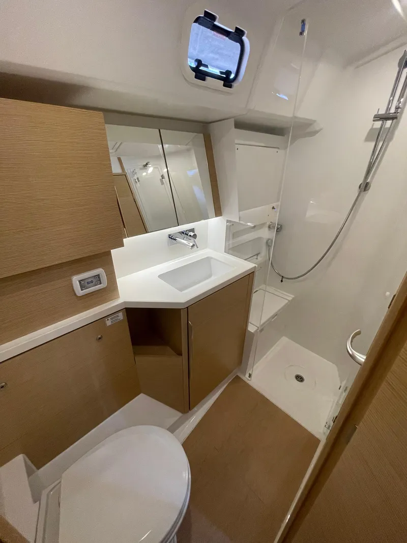 Slide: The Image of Modern bathroom in 2023 Hanse 460 yacht with sleek fixtures and wood accents. - 12