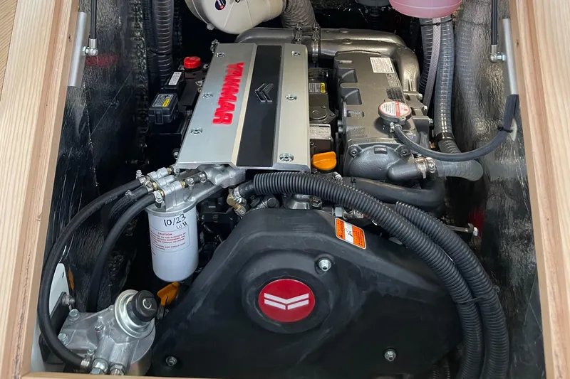Slide: The Image of Engine compartment of 2023 Hanse 460 yacht, featuring a Yanmar engine. - 17