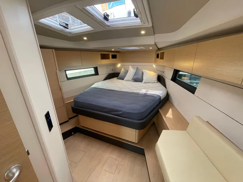 Slide: The Image of Luxurious interior of 2023 Hanse 460 yacht with modern bedroom design. - 9