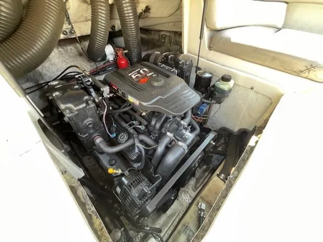 Slide: The Image of Engine compartment of a 2002 Sea Ray 220 Bow Rider boat. - 23