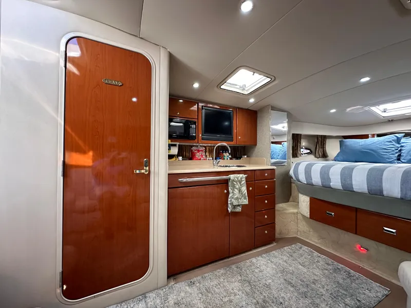 Slide: The Image of Luxurious interior of a 2004 Formula 34 PC yacht with plush seating and modern amenities. - 16