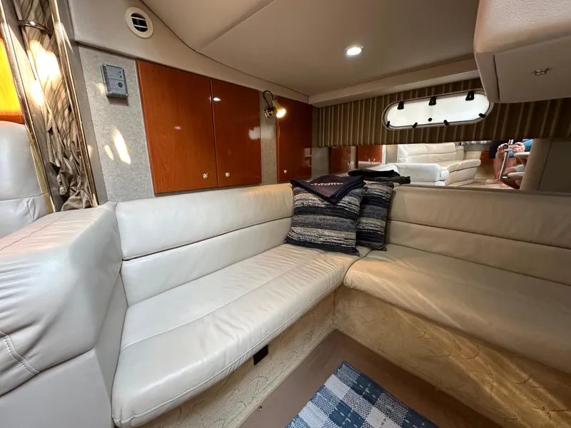 Slide: The Image of 2004 Formula 34 PC yacht bathroom with sink, toilet, and mirror. - 24