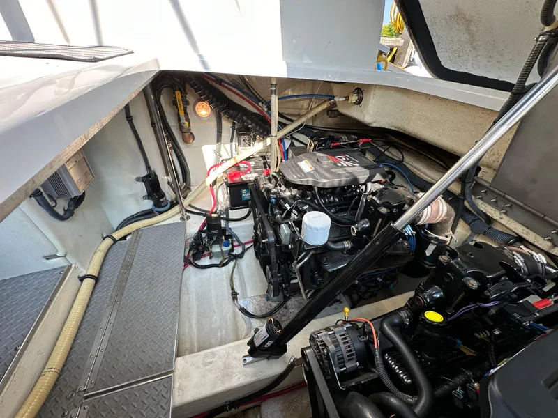 Slide: The Image of Engine compartment of a 2004 Formula 34 PC boat with twin MerCruiser engines. - 29