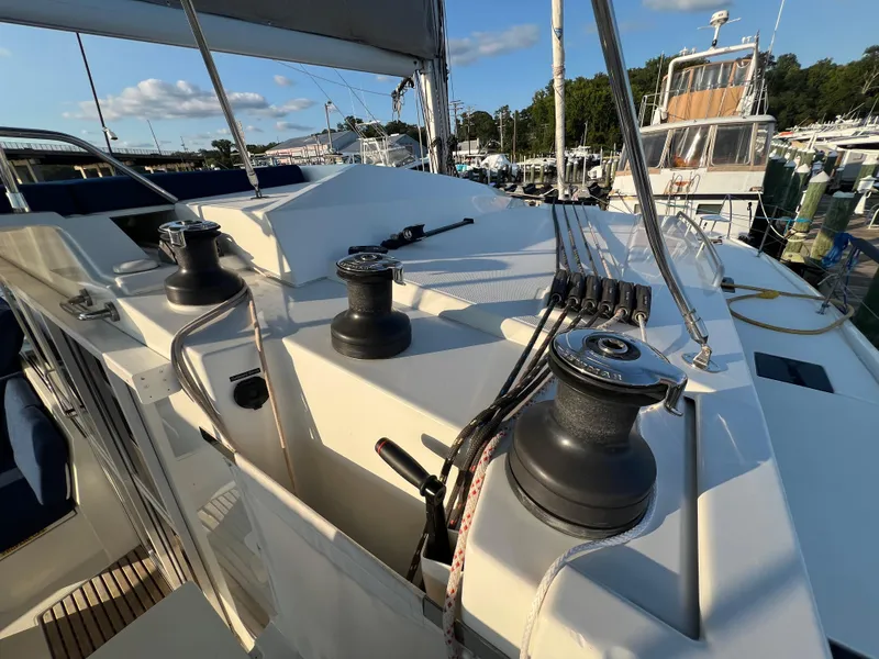 Slide: The Image of Fountaine Pajot Elba 45 sailboat deck with winches, 2020 model, docked at marina. - 10