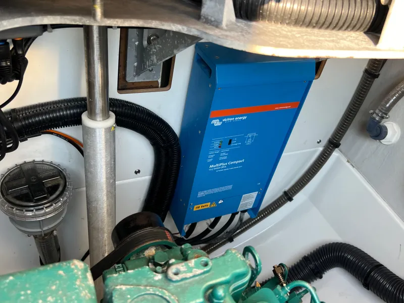 Slide: The Image of Engine compartment of 2020 Fountaine Pajot Elba 45 with blue electrical unit and wiring. - 18