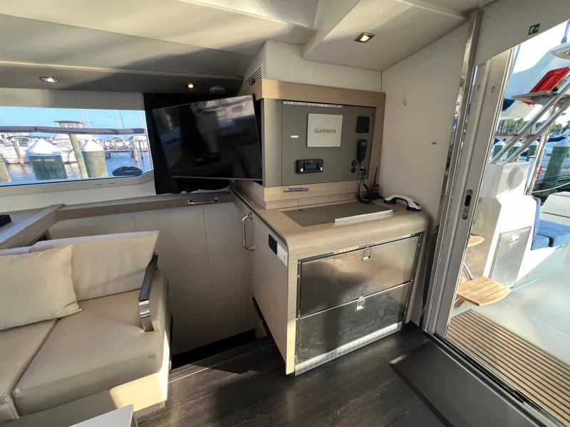 Slide: The Image of Modern interior of 2020 Fountaine Pajot Elba 45 catamaran with TV and navigation equipment. - 28