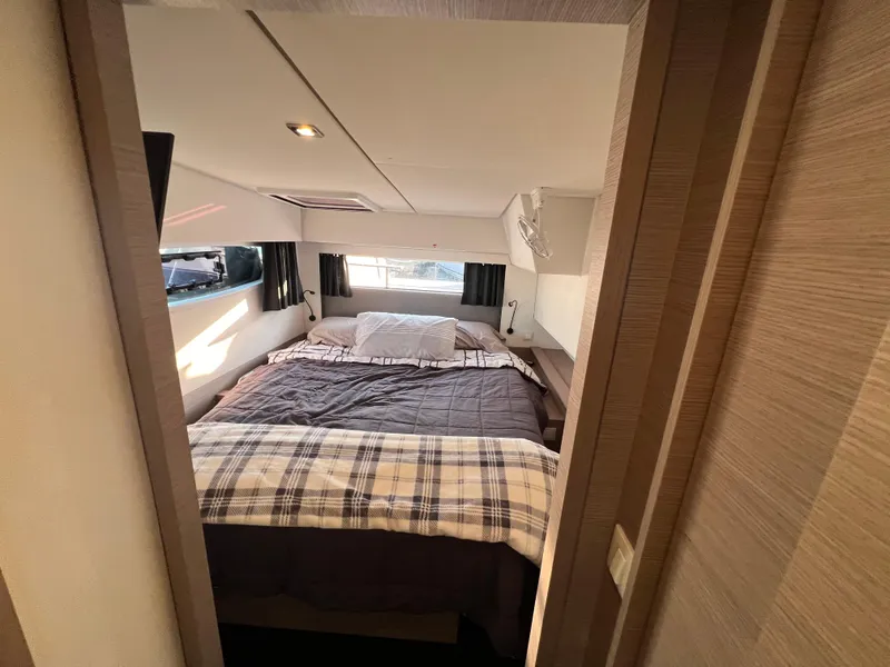 Slide: The Image of Cozy bedroom interior of 2020 Fountaine Pajot Elba 45 catamaran with natural light. - 30