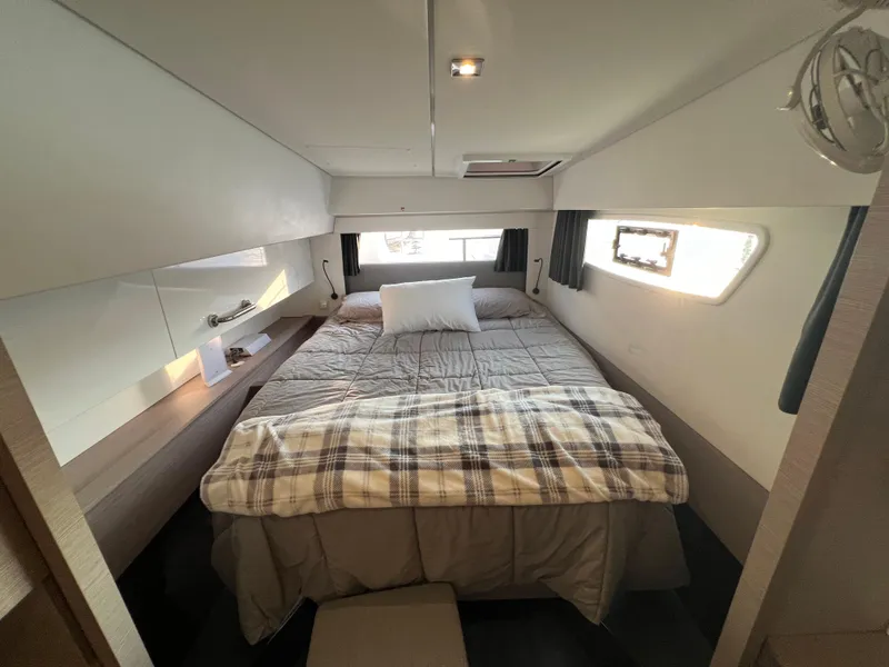 Slide: The Image of 2020 Fountaine Pajot Elba 45 cabin interior with cozy bed and modern design. - 36