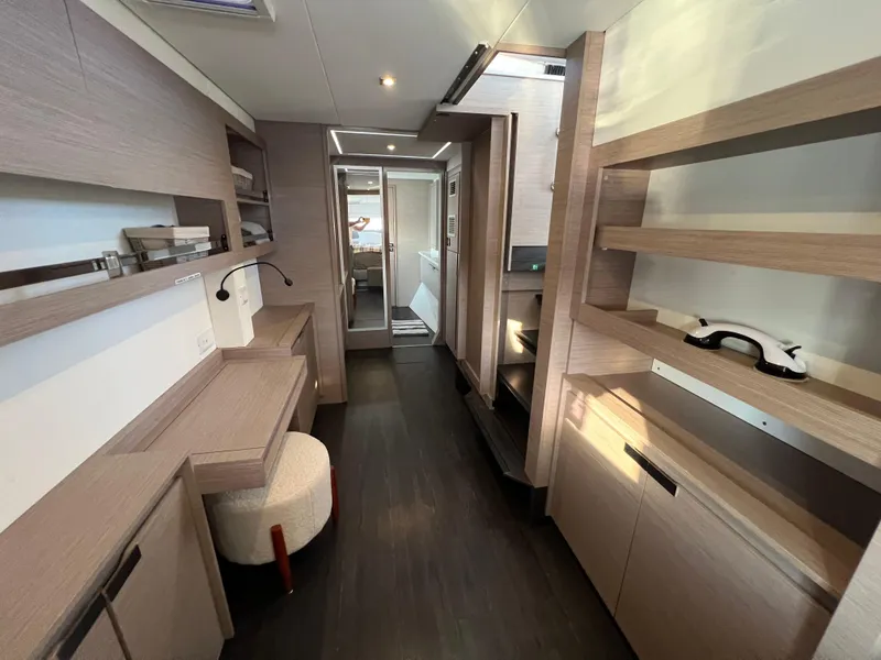 Slide: The Image of Modern interior of 2020 Fountaine Pajot Elba 45 catamaran with sleek wood finishes. - 39
