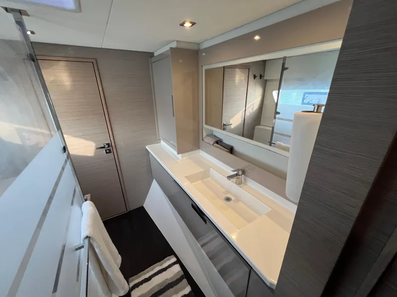 Slide: The Image of Modern bathroom interior on 2020 Fountaine Pajot Elba 45 yacht, featuring sleek design and ample lighting. - 42