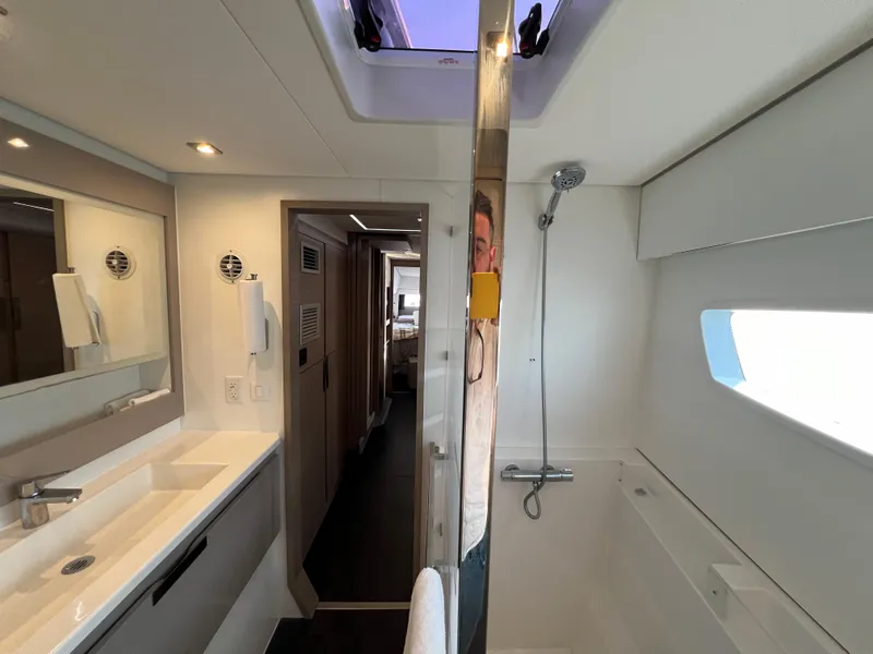 Slide: The Image of Modern bathroom interior of 2020 Fountaine Pajot Elba 45 catamaran, featuring sleek design and fixtures. - 43