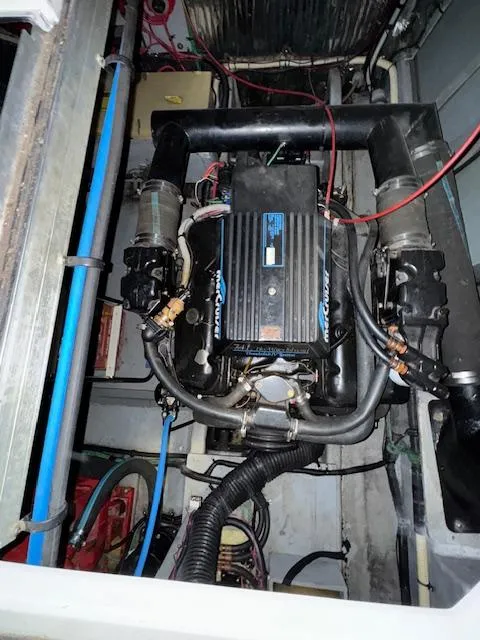 Slide: The Image of Engine compartment of a 1990 Sea Ray 420 Sundancer boat. - 21