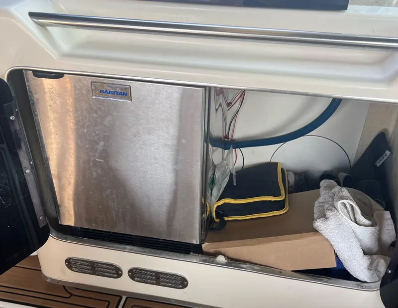 Slide: The Image of Raritan fridge in 1990 Sea Ray 420 Sundancer boat storage compartment. - 4