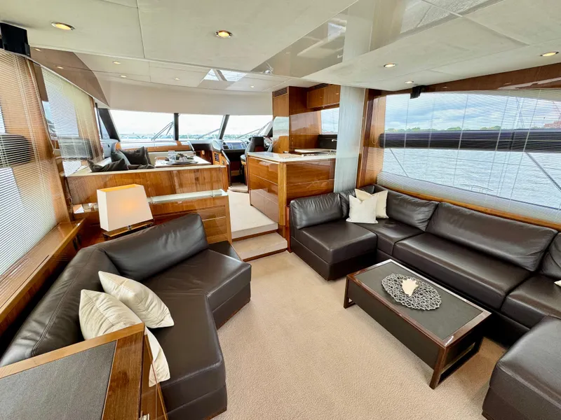 Slide: The Image of Luxurious interior of 2012 Princess Flybridge 60 Motor Yacht with leather seating and modern design. - 1