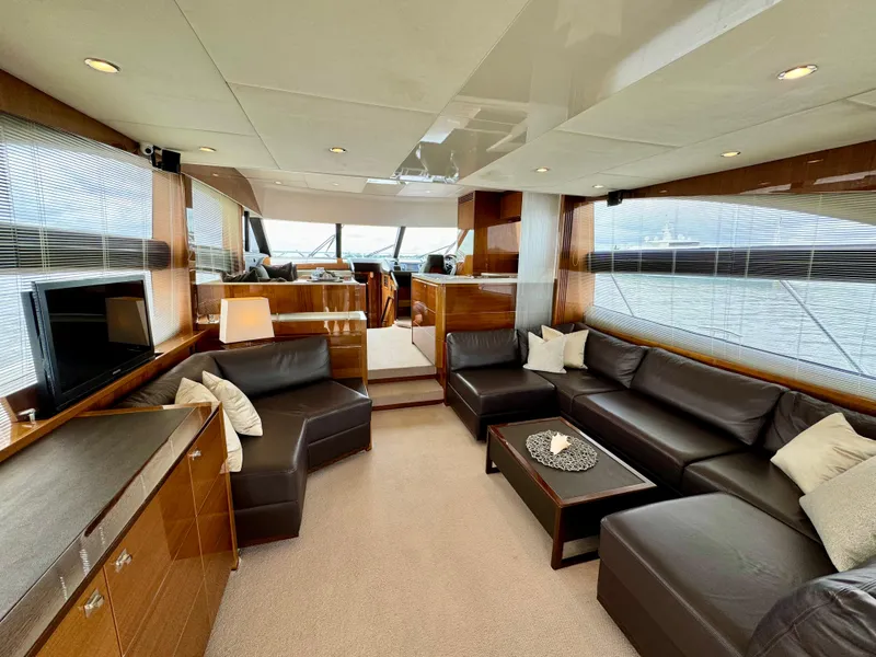 Slide: The Image of Luxurious interior of 2012 Princess Flybridge 60 Motor Yacht with leather seating and modern decor. - 12