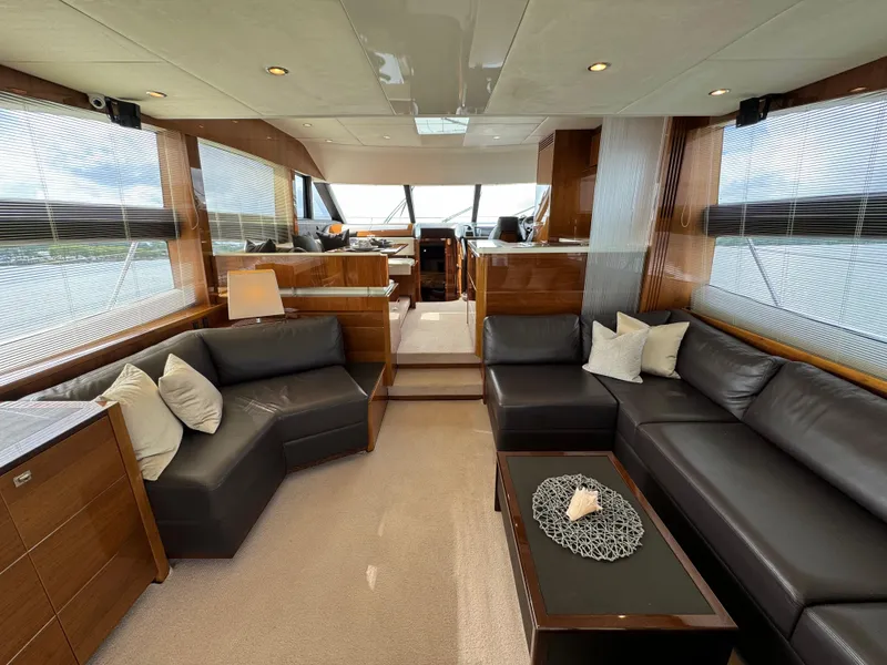 Slide: The Image of Luxurious interior of 2012 Princess Flybridge 60 Motor Yacht with leather seating and modern decor. - 13