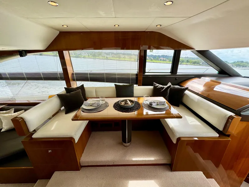 Slide: The Image of Luxurious interior of 2012 Princess Flybridge 60 Motor Yacht with elegant dining area. - 22