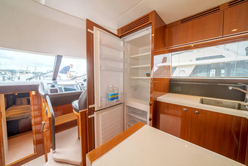 Slide: The Image of Luxurious kitchen interior of 2012 Princess Flybridge 60 Motor Yacht with open fridge. - 24